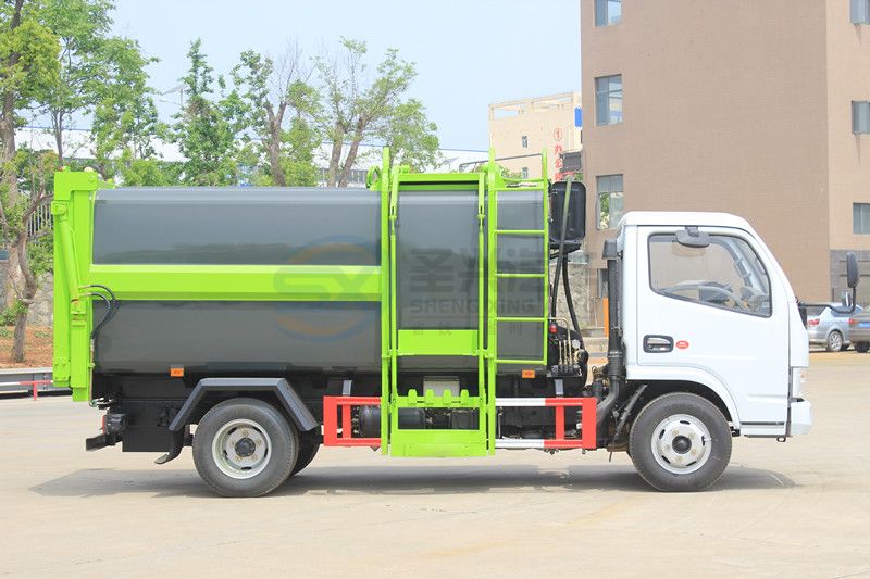 藍牌7.5方東風多利卡壓縮式掛桶垃圾車 藍牌7.5方東風多利卡壓縮式掛桶垃圾車